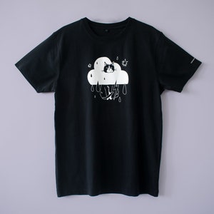 Rain Cloud Cat T-Shirt Hand screen printed on black organic cotton tee with white illustration of a not amused cat in a costume image 4