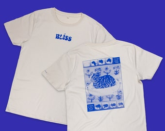 Bliss t-shirt | Hand screen printed on sand/beige organic cotton tee with blue comic style illustration of a tabby cat getting comfy