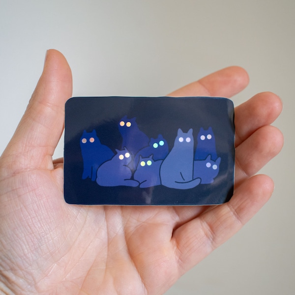 Reflecting Cat Eyes | Spooky holographic vinyl sticker of a cat gangs silhouettes who's eyes are glowing in the night
