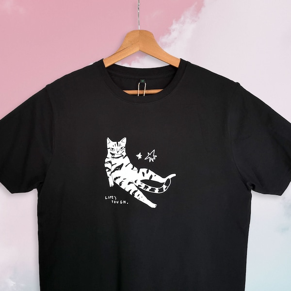 Life's tough | Cat T-shirt, Illustrated sitting tabby cat screen printed on black organic cotton t-shirt with water-based white ink, Life is