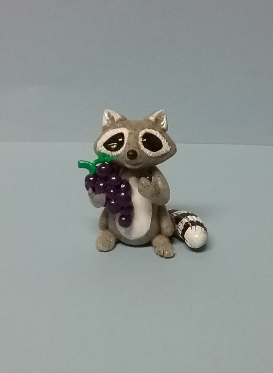 Hand Sculpted Raccoon Eating Grapes Figurine in Polymer Clay - Etsy UK Hand Sculpted Raccoon Eating Grapes Figurine in Polymer Clay - Etsy UK