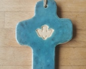 Croix en terre cuite  émaillée avec colombe