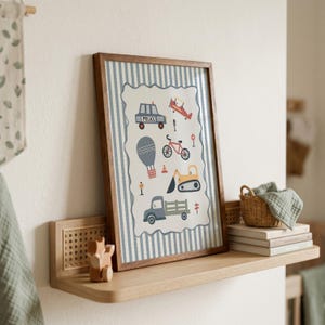 May include: A framed wall art print featuring a light blue and white striped background with a central scalloped panel displaying illustrations of a police car, airplane, bicycle, hot air balloon, excavator, and truck with various road signs.