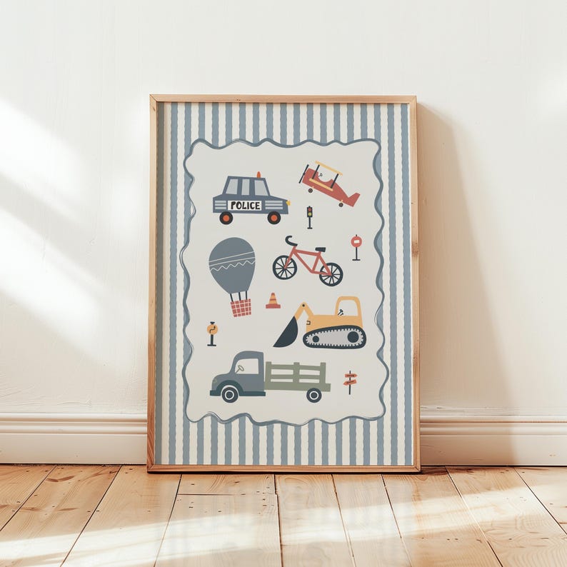 May include: A framed wall art print featuring a light blue and white vertical striped background. The central cream-colored area displays illustrations of a police car, a red airplane, a bicycle, a hot air balloon, an excavator, and a truck.