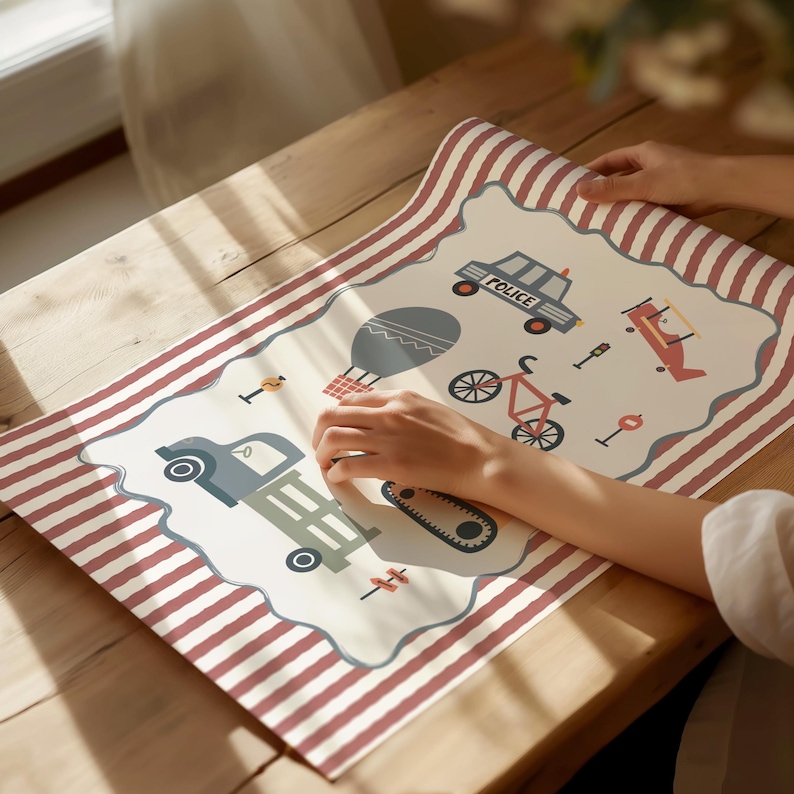 May include: A rectangular placemat featuring a cream-colored center with a scalloped border and red and white striped edges. The center displays illustrations of a police car with the text POLICE, a hot air balloon, a bicycle, and a tractor.