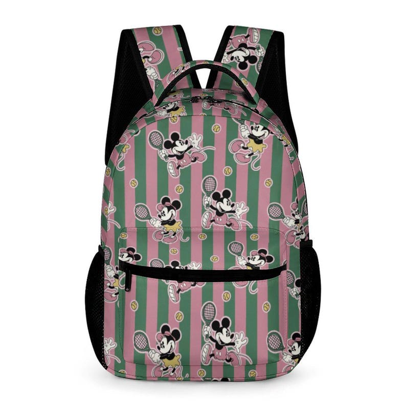 May include: A backpack featuring a repeating pattern of Mickey and Minnie Mouse playing tennis on a pink and green striped background. The backpack has black mesh side pockets and shoulder straps.