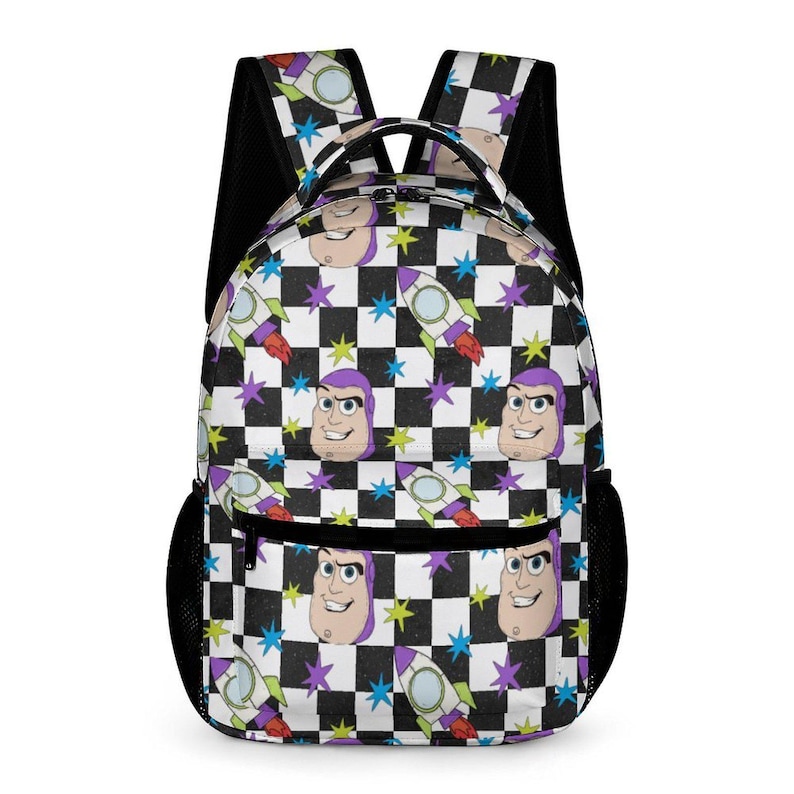 May include: A black and white chequered backpack with cartoon images of a character's face and rocket ships. The backpack has black mesh side pockets and shoulder straps. The design includes purple, blue, and green stars.