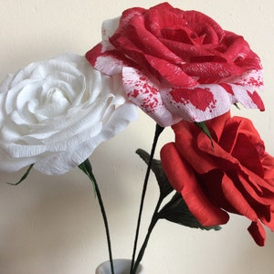 Painting the white roses red! Alice in Wonderland Crepe Paper Roses themed decorations. Wedding or party, First Anniversary