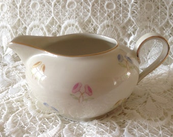 Vintage porcelain milk jug. 50s.
