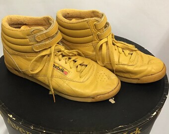 reebok yellow high tops