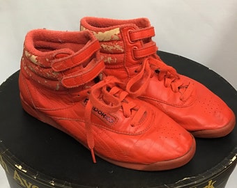 orange high top reeboks
