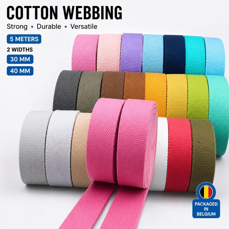 May include: Cotton webbing rolls in various colors, including pink, blue, and green. The text on the image reads "COTTON WEBBING" and "Strong, Durable, Versatile." The webbing is available in 30 mm and 40 mm widths, and is 5 meters long.