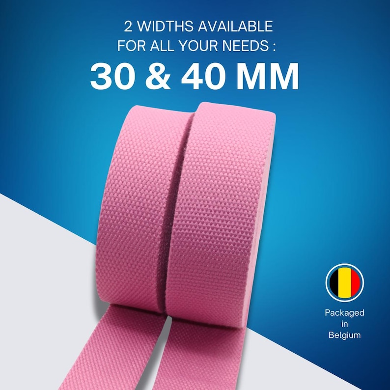 May include: Pink fabric rolls with the text "2 WIDTHS AVAILABLE FOR ALL YOUR NEEDS: 30 & 40 MM". The product is packaged in Belgium. The fabric is available in 30 mm and 40 mm widths.