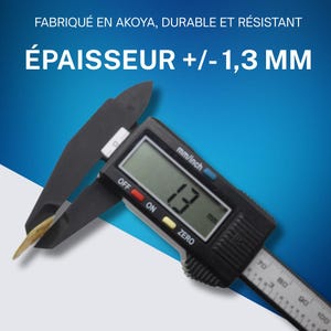 Puede incluir: Un calibre digital negro que muestra una medida de 1,3 mm. La herramienta tiene una regla con marcas en mm y pulgadas. El texto "FABRIQU&Eacute; EN AKOYA, DURABLE ET R&Eacute;SISTANT" y "&Eacute;PAISSEUR +/-1,3 MM" son visibles.