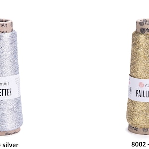 May include: Two spools of metallic yarn, one silver and one gold, labeled "YarnArt Paillettes".