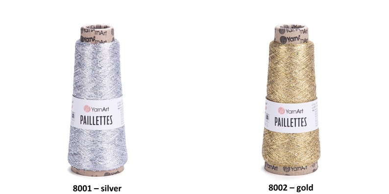 May include: Two spools of metallic yarn, one silver and one gold, labeled "YarnArt Paillettes".