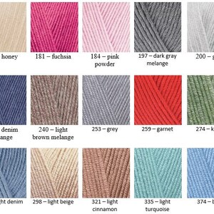 May include: Swatch card showing 12 different yarn colors. The colors are: honey, fuchsia, pink powder, dark gray melange, grey, denim melange, light brown melange, grey, garnet, khaki, light denim, light beige, light cinnamon, light turquoise, and blue.