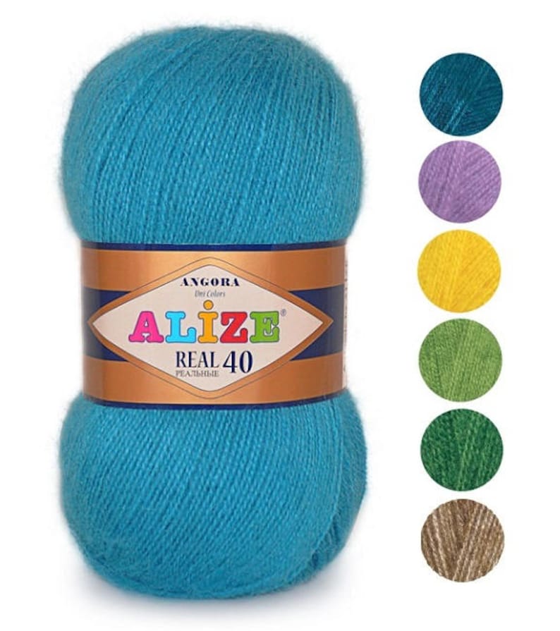May include: A skein of teal blue Alize Real 40 Angora yarn. The yarn is soft and fluffy, and the label says "Alize Real 40" and "Angora" in colorful letters. The image also shows eight color swatches of the yarn in different colors.