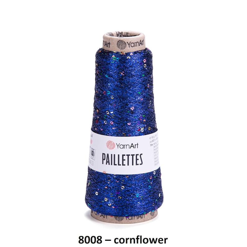 May include: A spool of blue yarn with iridescent sequins, labeled "YarnArt Paillettes 8008 - cornflower"