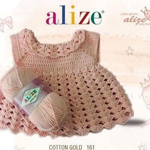 May include: A pink crocheted baby dress with a scalloped neckline and a ball of yarn labeled "Alize Cotton Gold 161".
