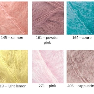 May include: A color chart featuring ten swatches of fuzzy, textured yarn in various shades: 87 coal grey, 145 salmon, 161 powder pink, 164 azure, 180 sagebrush, 209 fuchsia, 219 light lemon, 271 pink, 406 cappuccino, and 409 indigo.