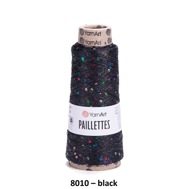 May include: A spool of black yarn with colorful sequins, labeled "YarnArt Paillettes 8010 - black".