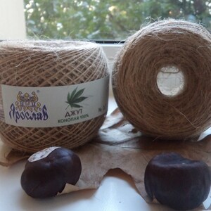 May include: Two spools of natural brown twine, one with a label that reads "Ярославль" and "Джут Конопля 400%".