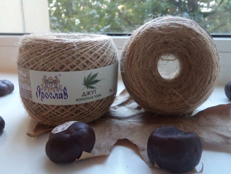 May include: Two spools of natural brown twine, one with a label that reads "Ярославль" and "Джут Конопля 400%".