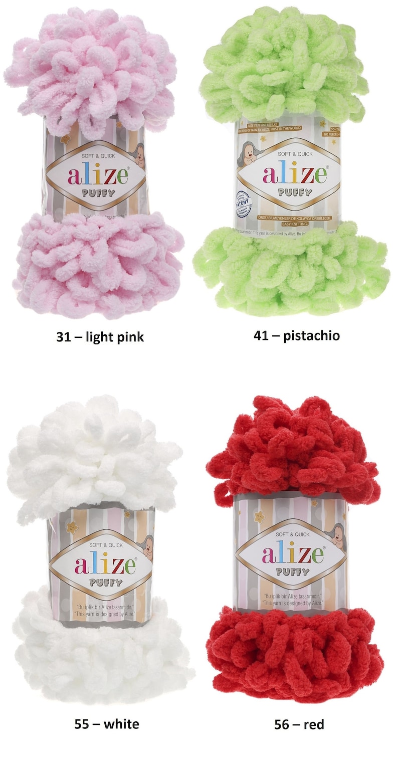 May include: Four skeins of Alize Puffy yarn in different colors: light pink, pistachio, white, and red. The yarn is soft and quick to knit with. Each skein has a label with the Alize logo and the words "Soft & Quick" and "Puffy".