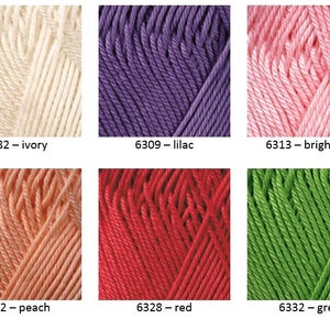 May include: Six skeins of yarn in different colors: ivory, lilac, bright pink, peach, red, and green. Each skein is labeled with a number and color name.