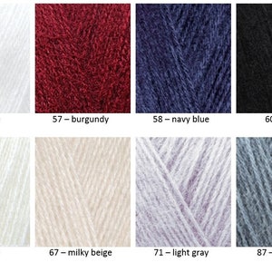Op de afbeelding: Garenkleurenkaart met 10 verschillende kleuren, waaronder wit, bordeauxrood, marineblauw, zwart, melkachtig, melkachtig beige, lichtgrijs en donkergrijs. De kaart toont de garenkleurnummers en -namen.
