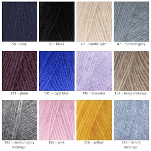 May include: A collection of yarn samples in various colors, including navy, black, candle light, medium grey, plum, royal blue, lavender, beige melange, medium grey melange, pink, yellow, and denim melange.