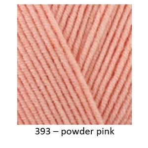 May include: Three balls of yarn in different colours: cherry red, powder pink, and green. The yarn is a soft, textured, and is suitable for knitting or crocheting.