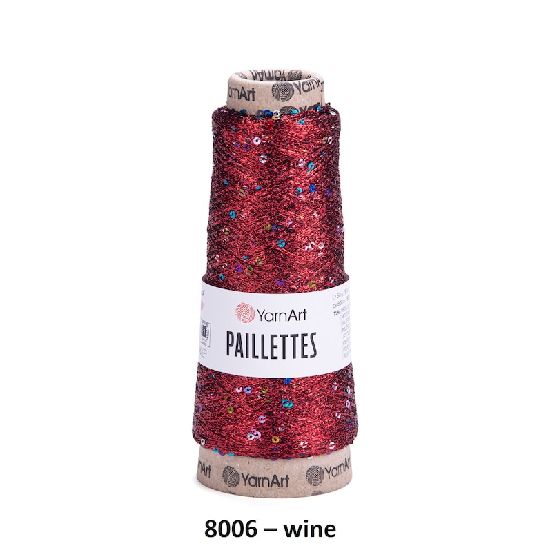 May include: A spool of red metallic yarn with colorful sequins, labeled "YarnArt Paillettes 8006 - wine".