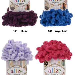 May include: Four skeins of Alize Puffy yarn in different colors: plum, royal blue, lilac, and fuchsia. The yarn is soft and quick to work with, and is perfect for creating cozy blankets, scarves, and hats.