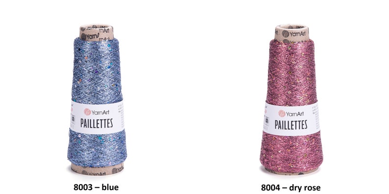 May include: Two spools of yarn with sequins, one blue and one pink. The yarn is labeled "YarnArt Paillettes".