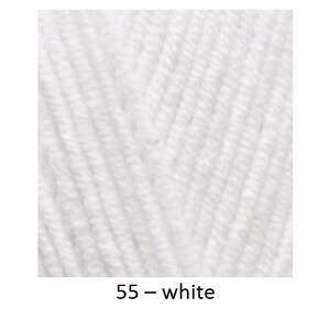 May include: Three balls of yarn in different colours: purple, white and red. The yarn is labelled with numbers and colour names: 44 - purple, 55 - white, 56 - red.