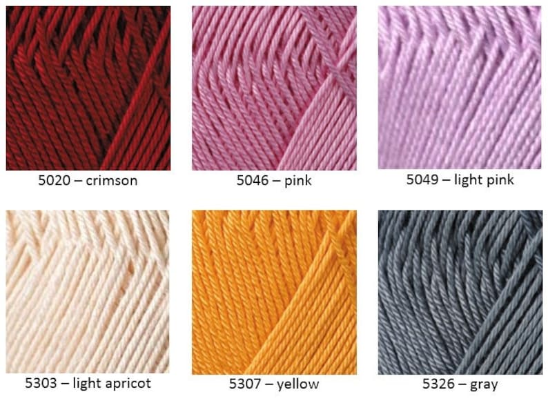 May include: Six skeins of yarn in different colors: crimson, pink, light pink, light apricot, yellow, and gray. The yarn is arranged in two rows of three skeins each.