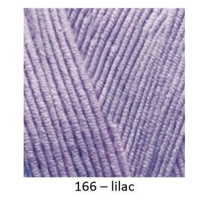 May include: Three balls of yarn in different colours: pink, lilac, and light yellow. The yarn is a soft, textured, and appears to be a blend of cotton and acrylic.