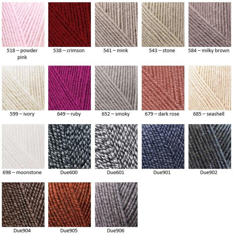 May include: A color chart of yarn samples in various shades of pink, red, beige, gray, and brown. The yarn samples are arranged in a grid pattern with the color names and numbers listed below each sample.