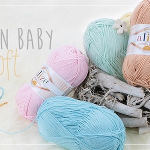 May include: Four balls of yarn in pink, light blue, peach, and green. The yarn is labeled "Alize Cotton Baby Soft".
