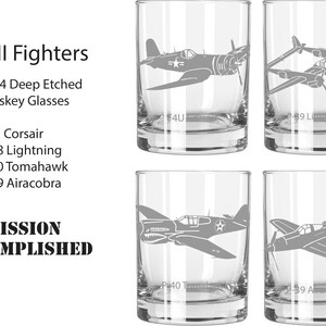May include: Set of four etched whiskey glasses featuring silhouettes of World War II fighter planes. The glasses are labelled with the names of the planes: F4U Corsair, P-38 Lightning, P-40 Tomahawk, and P-39 Airacobra. The text "MISSION ACCOMPLISHED" is printed below the glasses.