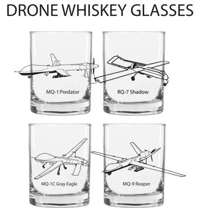 May include: Four clear whiskey glasses with black outlines of different drone models. The glasses are labeled with the names of the drones: MQ-1 Predator, RQ-7 Shadow, MQ-1C Gray Eagle, and MQ-9 Reaper.