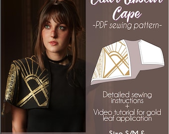 Könnte beinhalten: Ein schwarzer Umhang mit goldenen geometrischen Designs wird gezeigt. Das Bild enthält eine Zeichnung des Umhangs und den Text "Clair Obscur Cape - PDF sewing pattern-". Das Muster enthält detaillierte Nähanleitungen und ein Video-Tutorial.