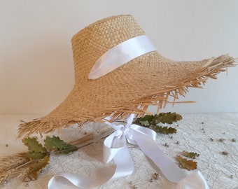 Wedding hat, summer straw hat for the bride, summer hat in natural straw, hat with frayed edges.