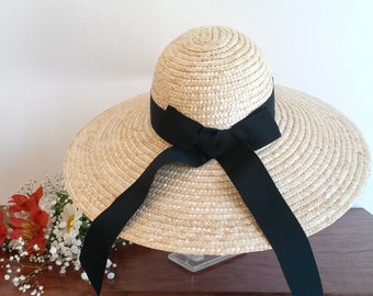 Wide-brimmed natural straw hat with ribbon and bow at the back, fancy straw hat, charming wedding hat