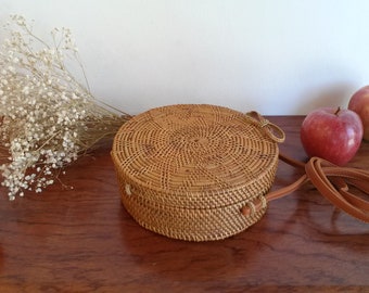 Round natural rattan bag with shoulder strap, vintage style summer bag, batik printed interior lining.