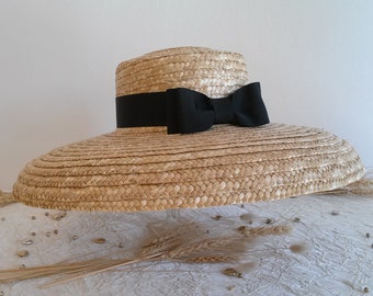 Straw hat, ceremonial hat in natural straw, large wide-brimmed hat with bow, straw summer hat.