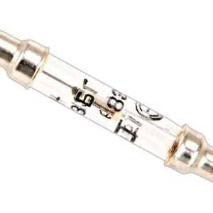 May include: A clear glass light bulb with a silver metal base. The bulb has black text that reads "8.5V 0.15A".