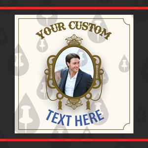May include: A white background with a gold ornate frame with a man's portrait inside. The text "YOUR CUSTOM TEXT HERE" is below the frame.